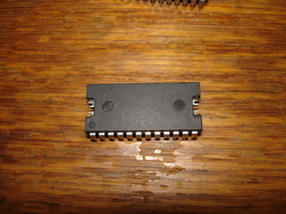 Bare 48T02 IC showing contacts